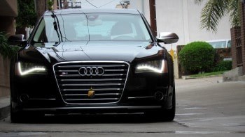 Black Audi after aluminum body panel repair and welding