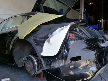 Quarter panel masked and ready for paint
